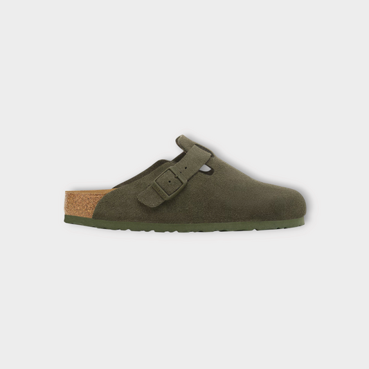 Drop Birkenstock Boston clogs in thyme green suede with a signature cork footbed and adjustable buckle strap