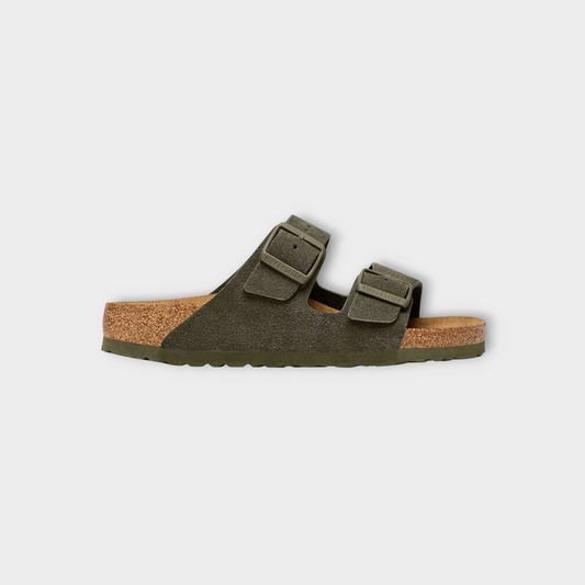 Drop Birkenstock Arizona sandals in thyme green suede with two adjustable straps and signature cork footbed