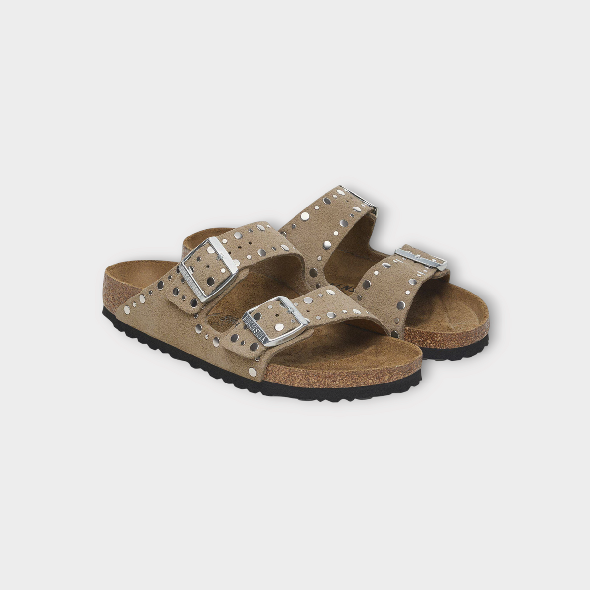 Drop Birkenstock Arizona sandals in taupe suede with silver rivet stud detailing and adjustable metal buckles