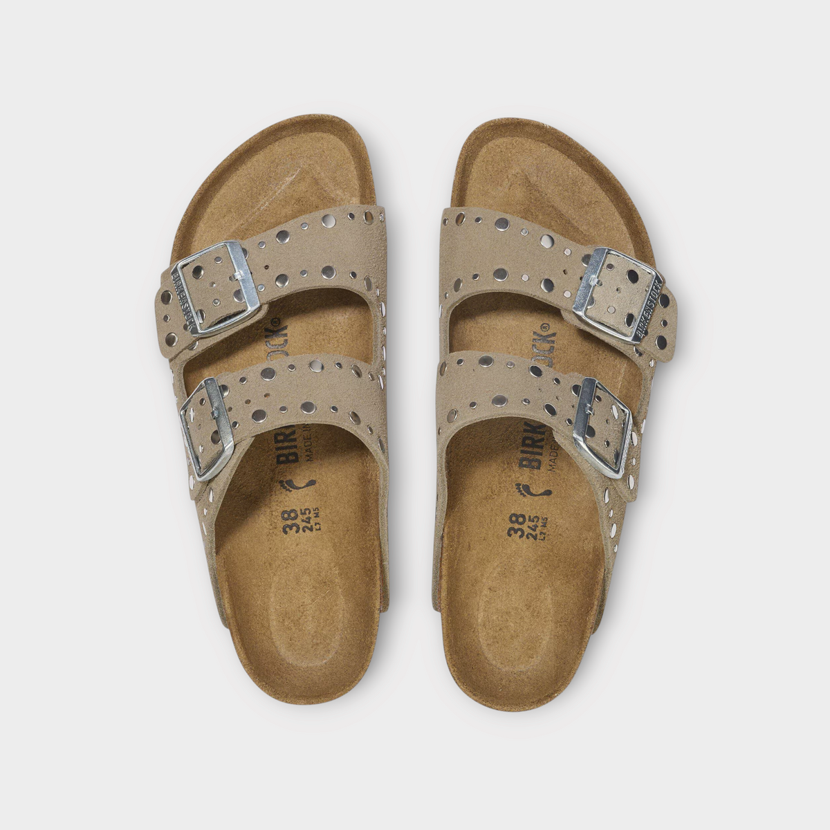 Drop Birkenstock Arizona sandals in taupe suede with silver rivet stud detailing and adjustable metal buckles