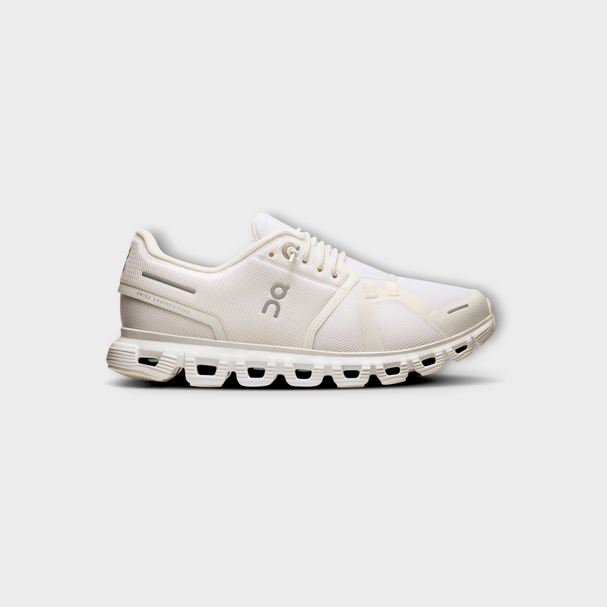 Drop On Cloud 6 women's running shoe in all-white with breathable mesh upper and signature cushioned sole