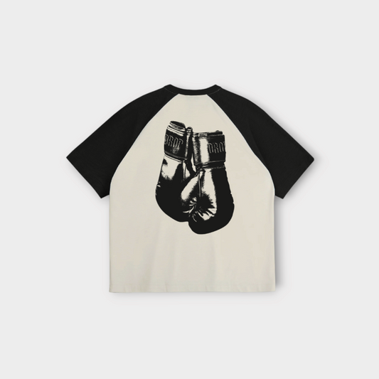 Drop Academy baseball t-shirt in cream with black raglan sleeves and a black boxing glove graphic on the back