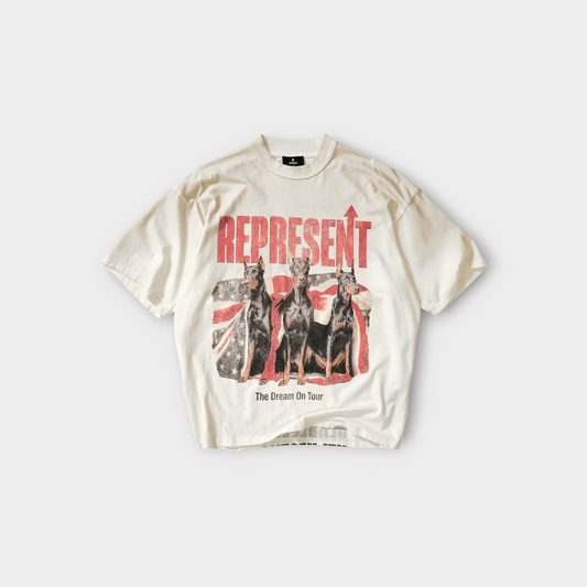 Drop Represent Dream On Tour t-shirt in washed ecru featuring a graphic of three Dobermans and an American flag
