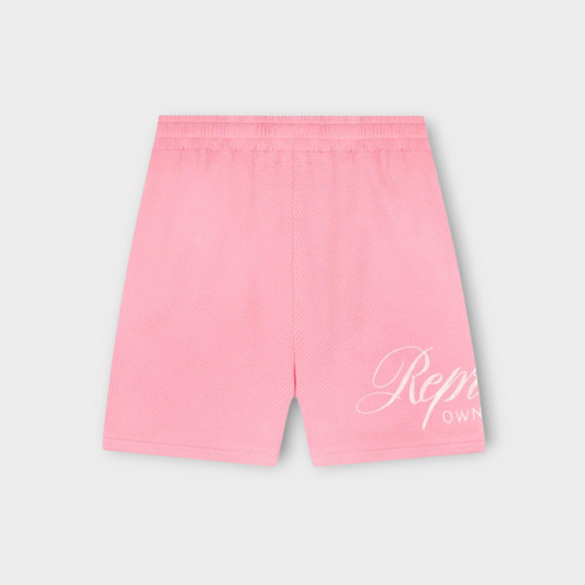 Drop Represent Owners Club pink mesh shorts with white script logo detail on the leg