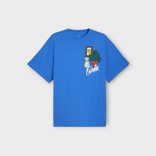 Drop Puma Commissioner Dylan T-Shirt II in mountain blue with a graphic print of a cat, clock, and plant on the chest
