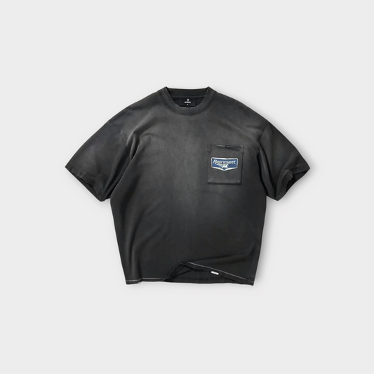 Drop Represent Nothing Faster t-shirt in stained black with a chest pocket and vintage graphic patch