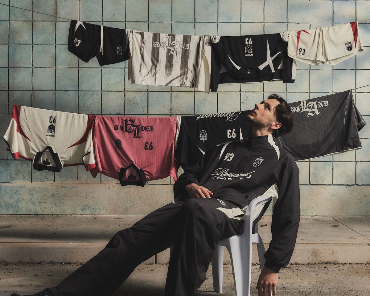 DROP new season campaign, football jerseys hanging on a tiled wall