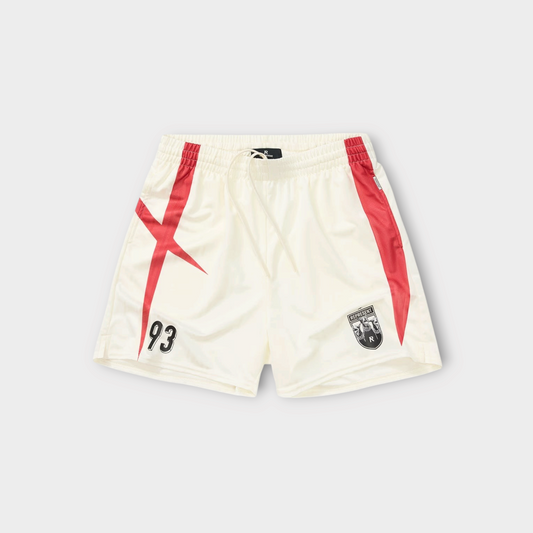 Drop Represent white football shorts with red spike graphic, number 93 print, and crest patch on an elastic waist.