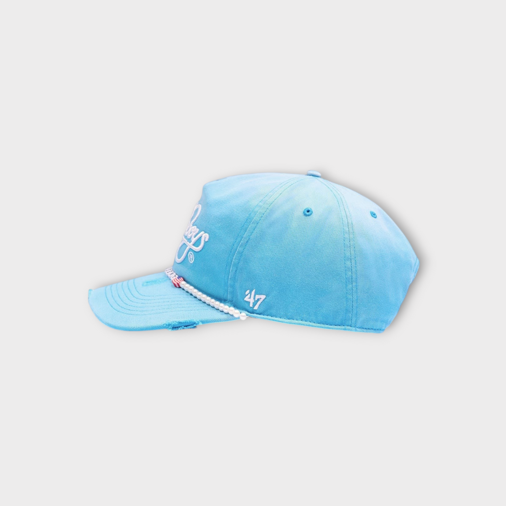 Drop Represent Beach Boys Tour bright blue baseball cap with white embroidery and pearl detail on the brim
