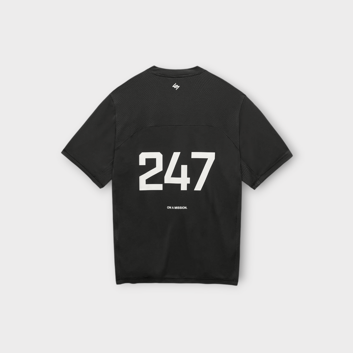 Drop 247 FW26 Numbers T-shirt in jet black with white graphic print on the back and mesh panel detailing.