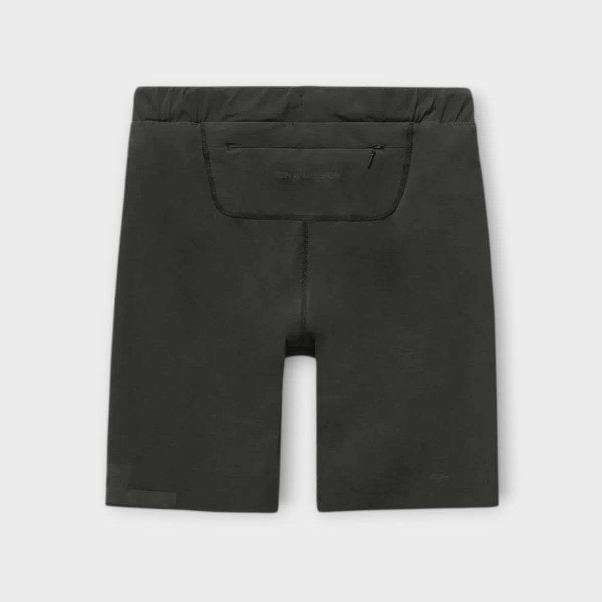 Drop 247 Ghost Short in jet black featuring a rear zippered pocket and minimalist athletic design