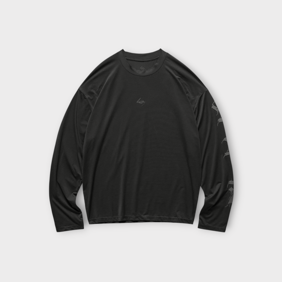 Drop 247 Knight Ls Tee in jet black with long sleeves and subtle graphic detailing on the arm