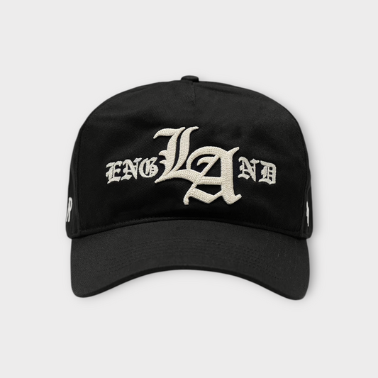 Drop Represent LA ENGLAND Old English cap in jet black with white embroidered gothic lettering on the front
