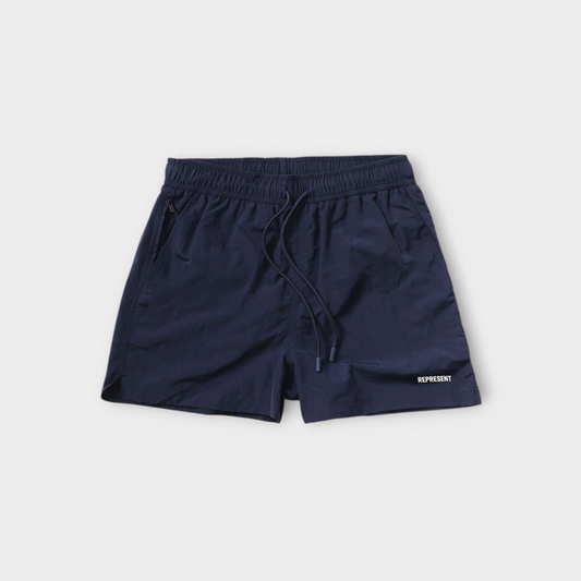 Drop Represent Core navy blue swim shorts with an elasticated drawstring waistband and small logo detail.
