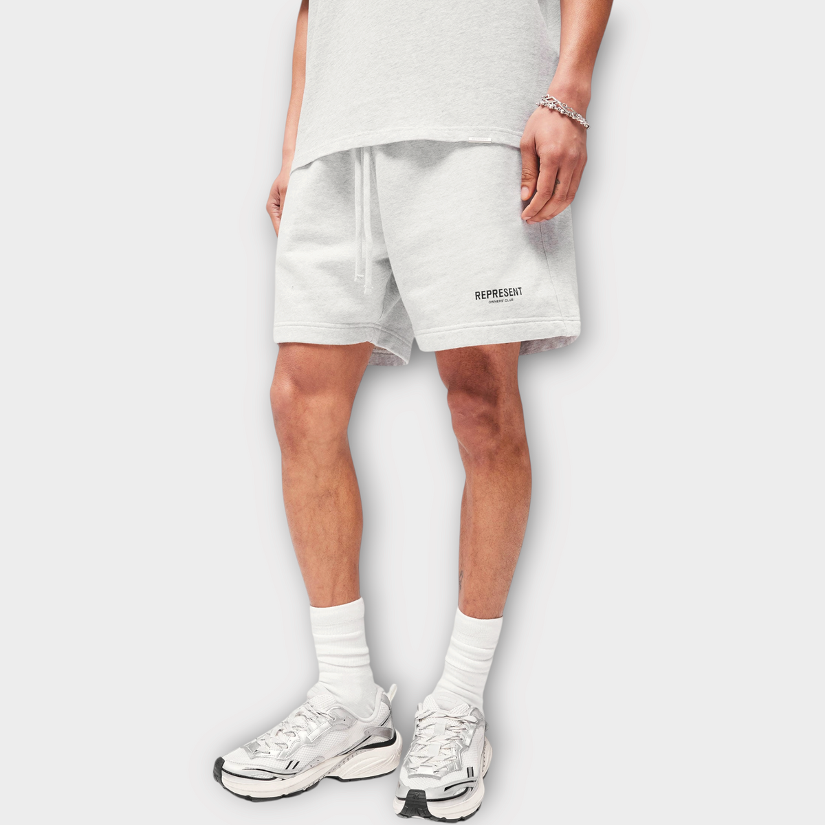 Drop Represent Owners Club ash grey cotton jersey shorts with black logo branding and drawstring waist